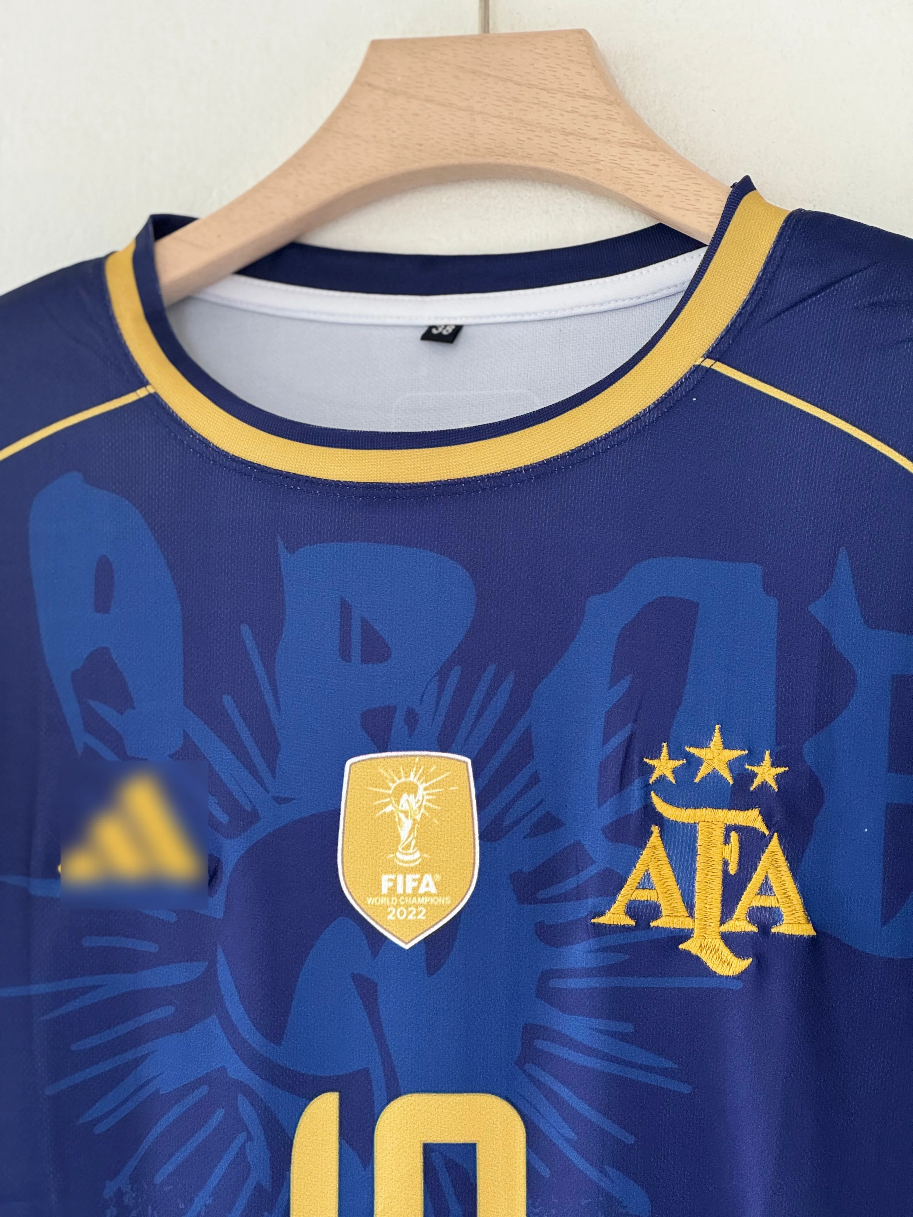 Champions Edition — Argentina Away Jersey (Navy Blue with Gold Accents) embroidery - Image 2