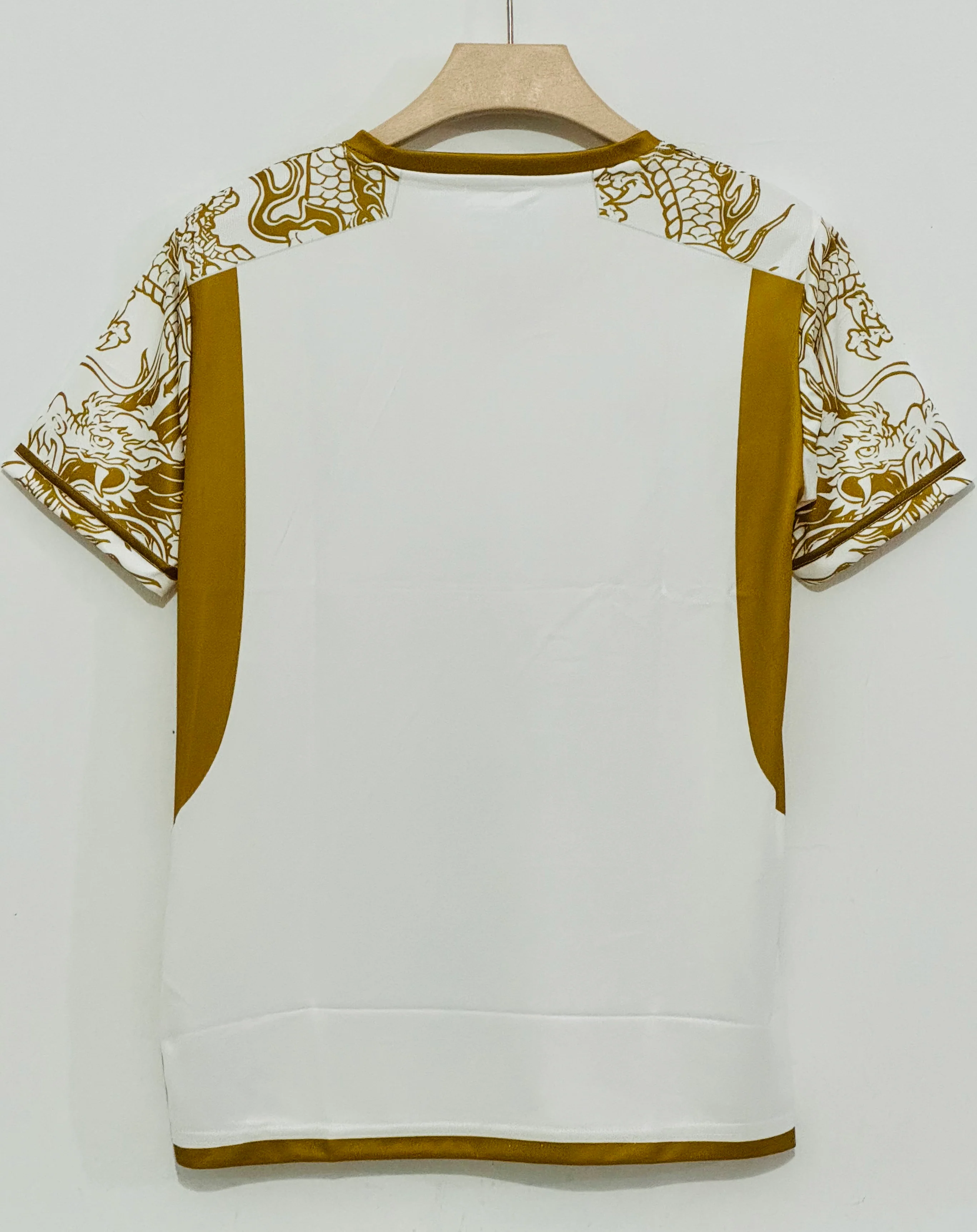 Unleash Royal Power with the 2024-25 Real Madrid Gold Dragon Jersey – Embroidery Edition - Image 2